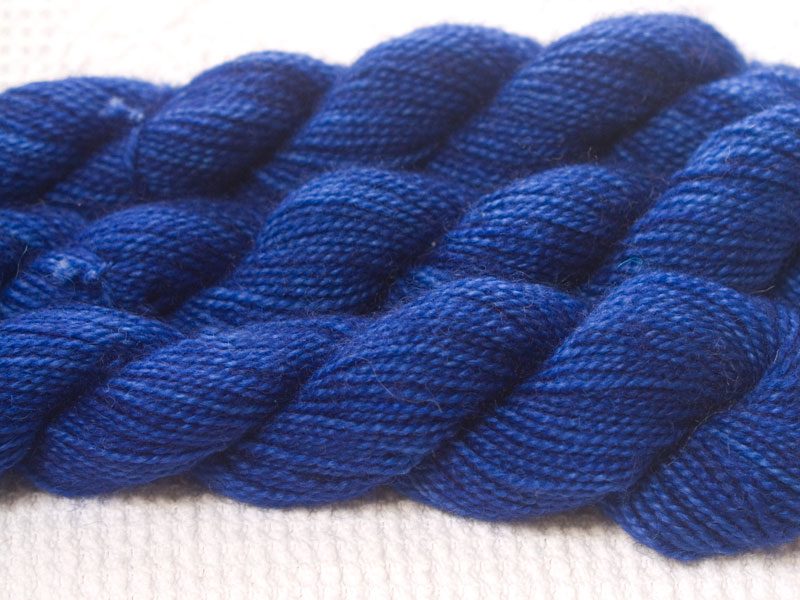 Navigator - Semi-solid deep blue superwash Bluefaced Leicester (BFL) 4-ply/fingering/sock yarn mini skein. Hand-dyed by Triskelion Yarn