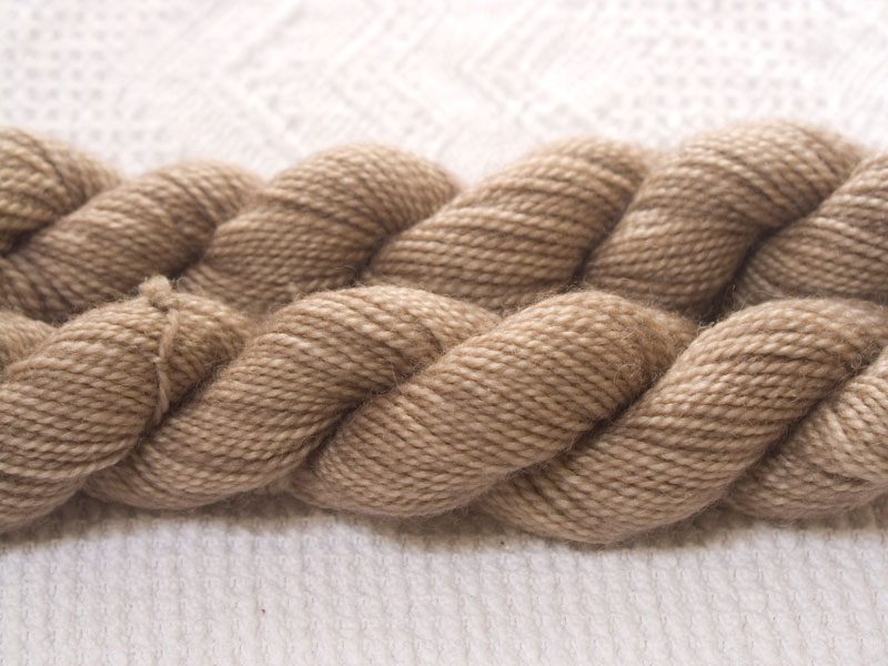 Woodcut - Semi-solid to solid cool light brown superwash Bluefaced Leicester (BFL) 4-ply/fingering/sock yarn mini skein. Hand-dyed by Triskelion Yarn