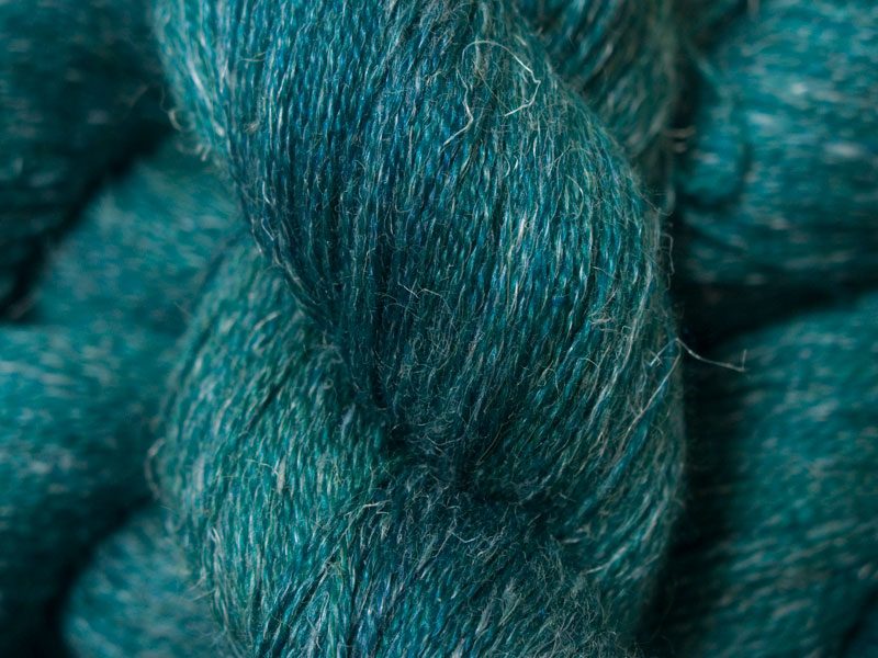 Mid to dark teal green Baby Alpaca, silk and linen heavy laceweight yarn. Hand-dyed by Triskelion Yarn.