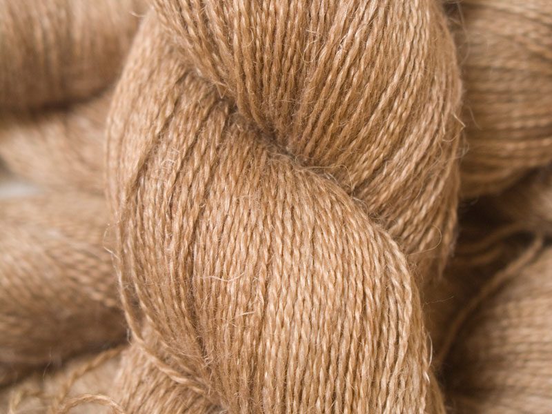 Light to mid brown Baby Alpaca, silk and linen heavy laceweight yarn. Hand-dyed by Triskelion Yarn.