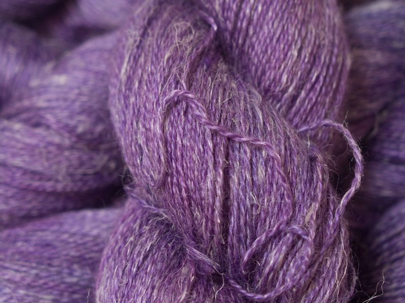 Semi-solid mid-tone purple Baby Alpaca, silk and linen heavy laceweight yarn. Hand-dyed by Triskelion Yarn.