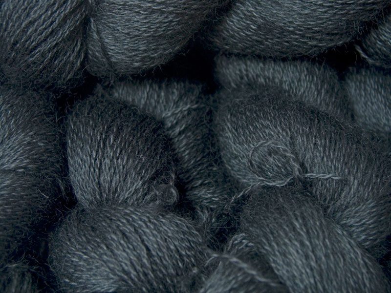 Soft charcoal black hand-dyed Wensleydale DK/ Double Knit yarn. Hand-dyed by Triskelion Yarn