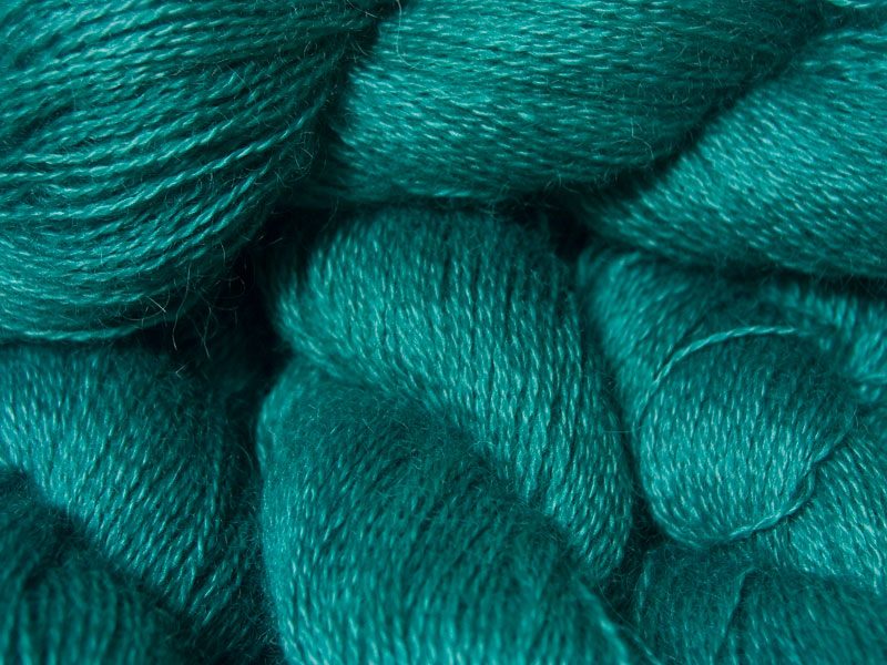 Mid-toned teal green hand-dyed Wensleydale DK/ Double Knit yarn. Hand-dyed by Triskelion Yarn