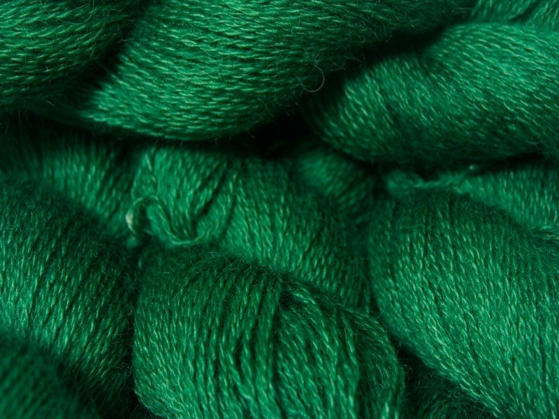 Mid-toned green hand-dyed Wensleydale DK/ Double Knit yarn. Hand-dyed by Triskelion Yarn