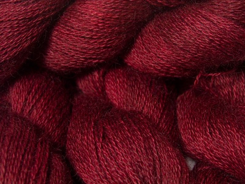 Deep red hand-dyed Wensleydale DK/ Double Knit yarn. Hand-dyed by Triskelion Yarn