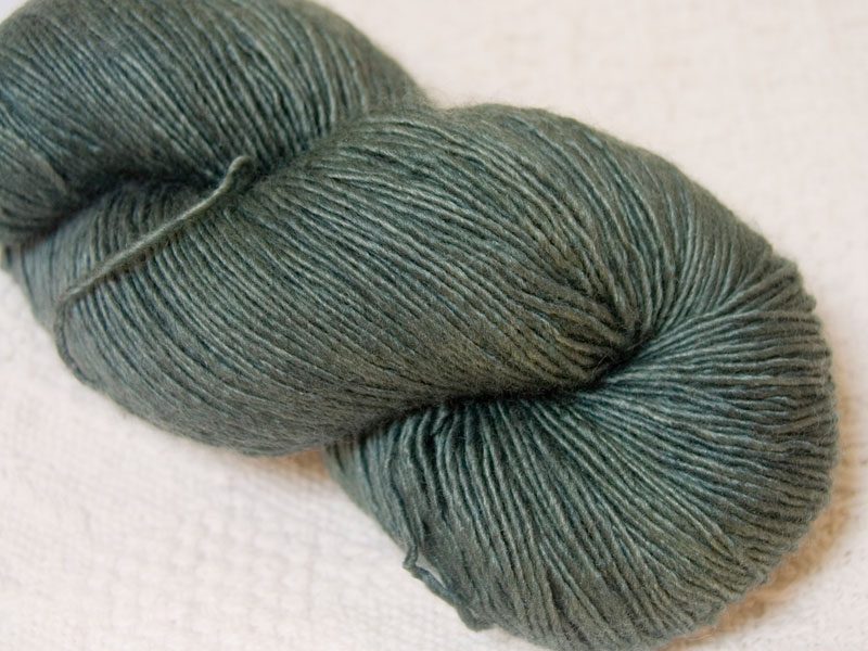Mid sea grey Falklands Merino and silk blend yarn. Hand-dyed by Triskelion Yarn.