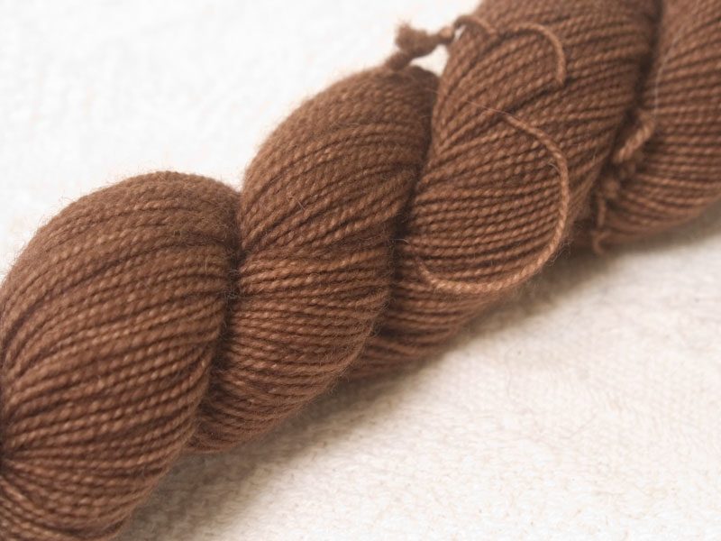 Warm mid brown superwash Bluefaced Leicester (BFL) 4-ply/fingering/sock yarn. Hand-dyed by Triskelion Yarn