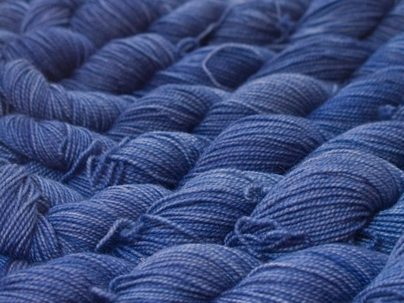 Semi-solid deep cornflower blue superwash Bluefaced Leicester (BFL) 4-ply/fingering/sock yarn. Hand-dyed by Triskelion Yarn