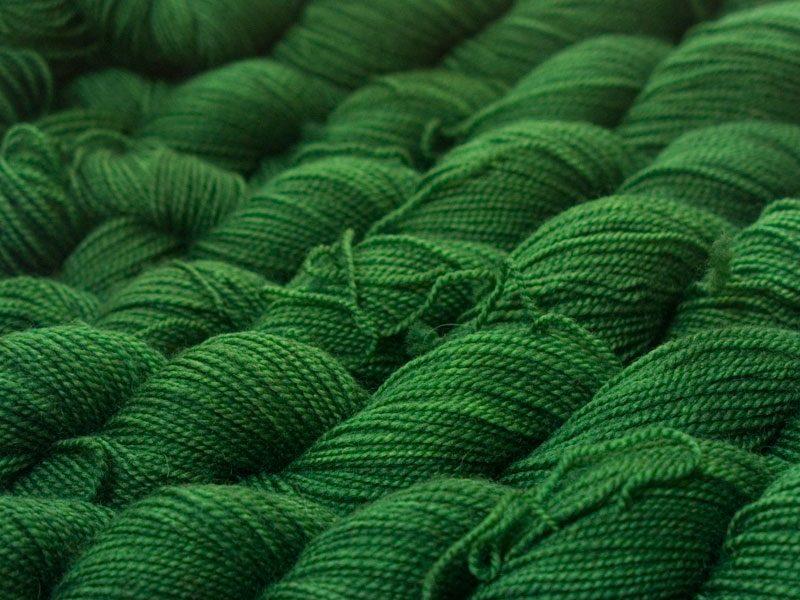 Mid-toned green superwash Bluefaced Leicester (BFL) 4-ply/fingering/sock yarn. Hand-dyed by Triskelion Yarn