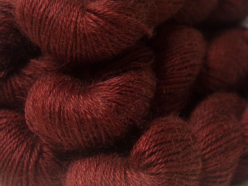 Semi-solid deep chestnut brown, with hints of russet and red hand-dyed Wensleydale DK/ Double Knit yarn. Hand-dyed by Triskelion Yarn