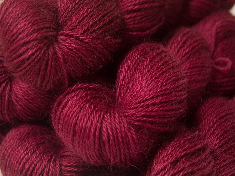 Semi-solid dark rose, with tones of pink and carmine hand-dyed Wensleydale DK/ Double Knit yarn. Hand-dyed by Triskelion Yarn