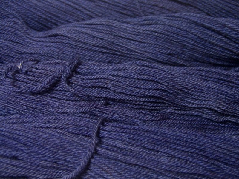 Semi-solid mid to light blue-violet, with tones of lavender and light cobalt Bluefaced Leicester (BFL) / Masham aran yarn. Hand-dyed by Triskelion Yarn