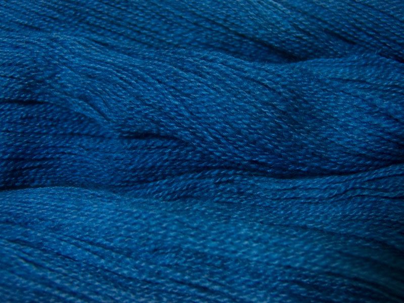 Sapphire blue Bluefaced Leicester (BFL) / Gotland 4-ply (fingering) yarn. Hand-dyed by Triskelion Yarn
