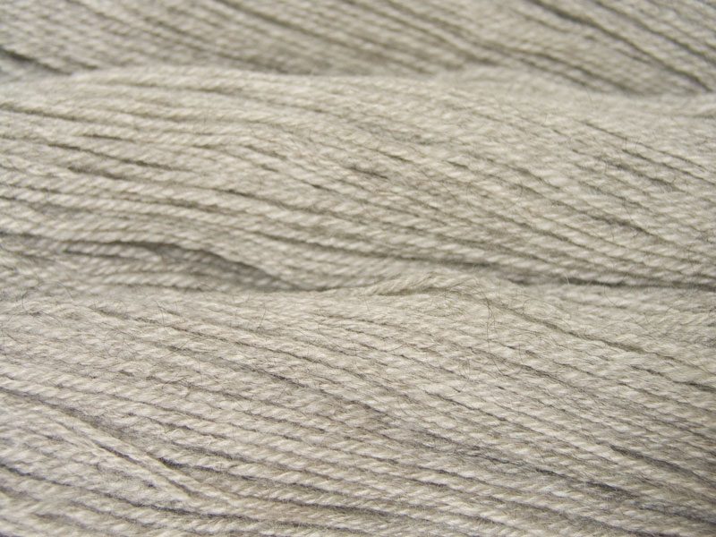 Ember's End - Semi-solid pale grey, with bright ash and silver tones Bluefaced Leicester (BFL) / Gotland dlouble knit (DK) yarn. Hand-dyed by Triskelion Yarn