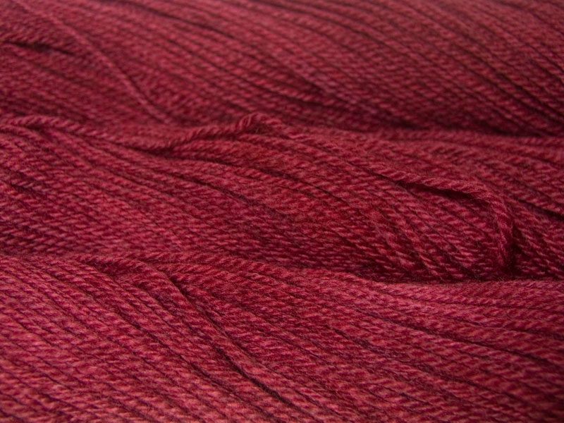 Modraniht - Semi-solid dark rose, with tones of pink and carmine Bluefaced Leicester (BFL) / Gotland dlouble knit (DK) yarn. Hand-dyed by Triskelion Yarn