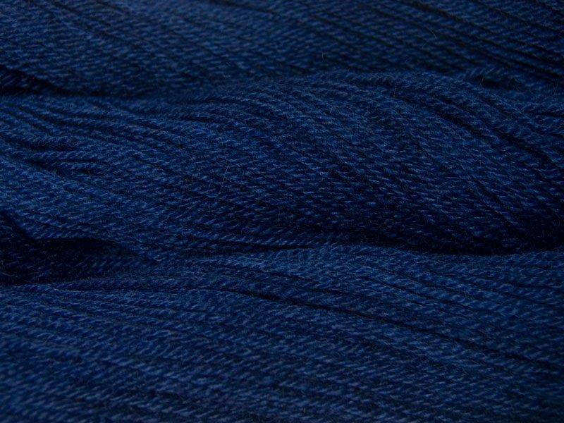 Navigator - Semi-solid midnight blue, with violet and cobalt tones Bluefaced Leicester (BFL) / Gotland dlouble knit (DK) yarn. Hand-dyed by Triskelion Yarn
