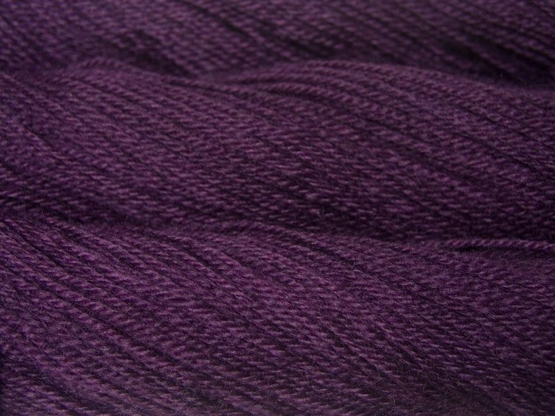 Ring Giver - Semi-solid dark purple, with red-violet and royal purple tones Bluefaced Leicester (BFL) / Gotland dlouble knit (DK) yarn. Hand-dyed by Triskelion Yarn