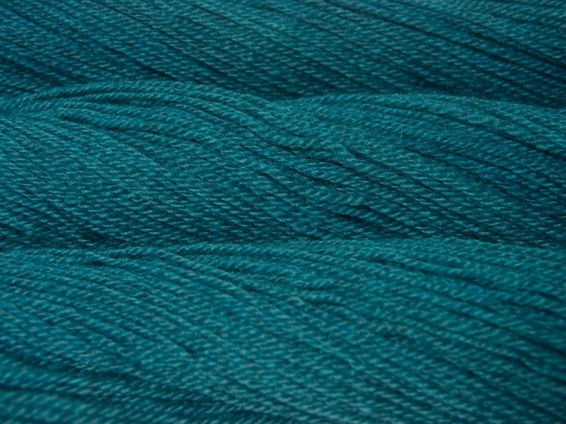Tarn - Semi-solid turquoise, with sea blue and grey tones Bluefaced Leicester (BFL) / Gotland dlouble knit (DK) yarn. Hand-dyed by Triskelion Yarn
