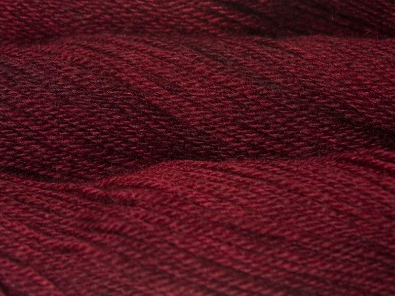 Vinland - Semi-solid deep claret red Bluefaced Leicester (BFL) / Gotland dlouble knit (DK) yarn. Hand-dyed by Triskelion Yarn