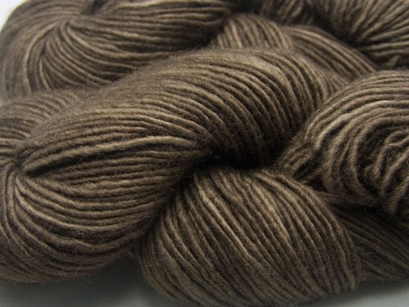Cool mid to dark brown Bluefaced Leicester double knit (DK) singles yarn hand-dyed by Triskelion Yarns