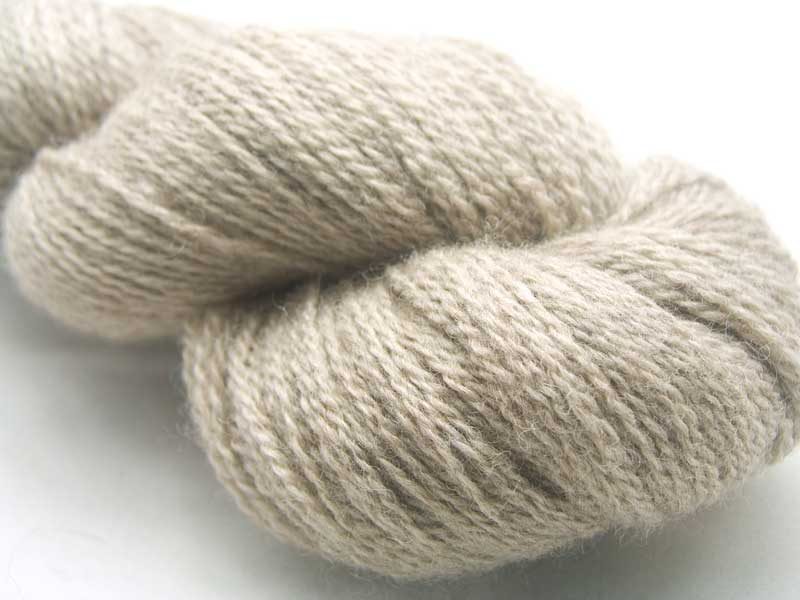 Oat - Semi-solid to solid soft cool beige Bluefaced Leicester (BFL) / Masham aran yarn. Hand-dyed by Triskelion Yarn