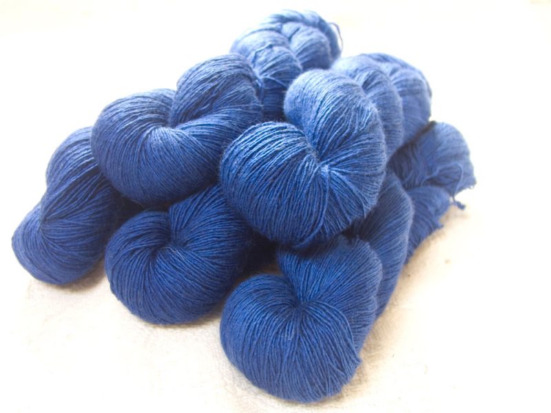 Navigator - Semi-solid deep blue Falklands Merino and silk blend yarn. Hand-dyed by Triskelion Yarn.