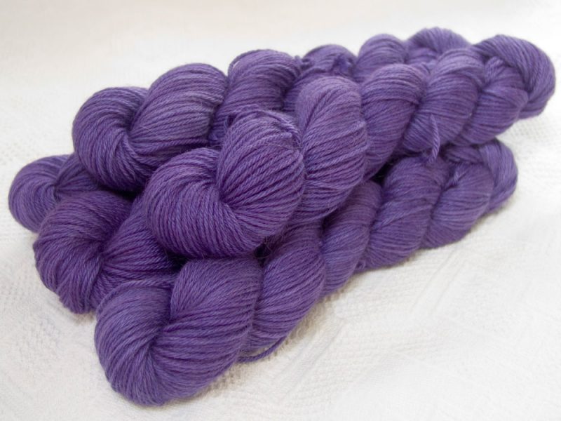 Saxnot - Semi-solid mid-tone purple Baby Alpaca Silk & Cashmere double-knit yarn. Hand-dyed by Triskelion Yarn.
