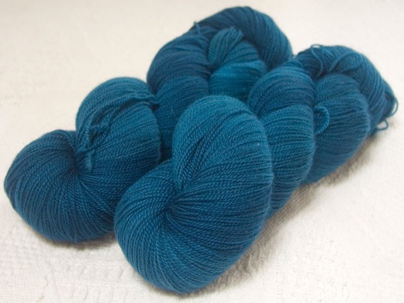Captain Cat - Semi-solid dark turquoise extra fine Falklands Merino 2-ply laceweight yarn hand-dyed by Triskelion Yarns