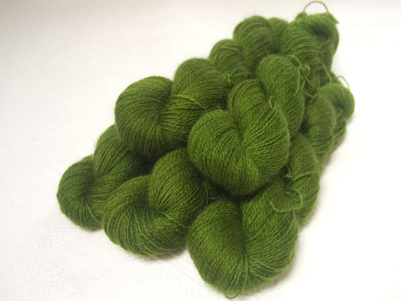 Rum and Laverbread - Semi-solid foliage green, with ochre and olive tones hand-dyed Wensleydale DK/ Double Knit yarn. Hand-dyed by Triskelion Yarn