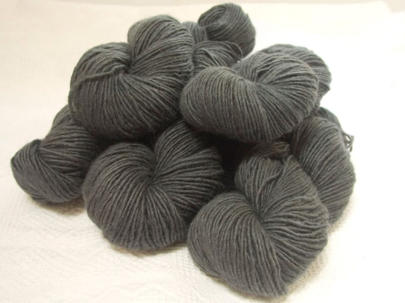 Graphite - Mid to dark grey Bluefaced Leicester (BFL) / Masham worsted yarn. Hand-dyed by Triskelion Yarn