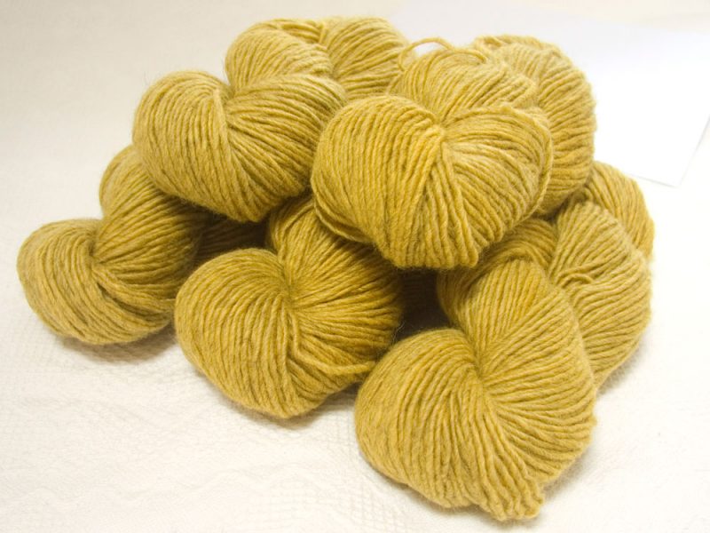 Lleu - Light cool yellow Bluefaced Leicester (BFL) / Masham worsted yarn. Hand-dyed by Triskelion Yarn