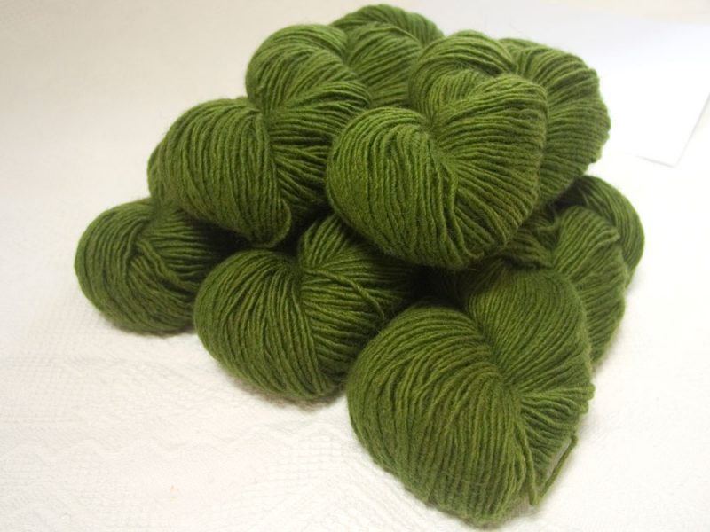 Rum and Laverbread - Semi-solid foliage green, with ochre and olive tones Bluefaced Leicester (BFL) / Masham worsted yarn. Hand-dyed by Triskelion Yarn