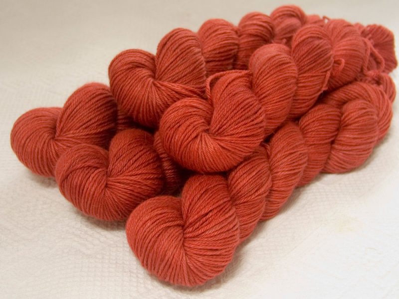Ember - Fiery orange-red Baby Alpaca Silk & Cashmere double-knit yarn. Hand-dyed by Triskelion Yarn.