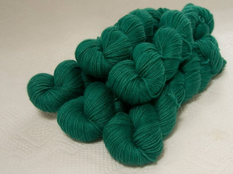 Nicor - Semi-solid mid-tone blue-green Baby Alpaca Silk & Cashmere double-knit yarn. Hand-dyed by Triskelion Yarn.