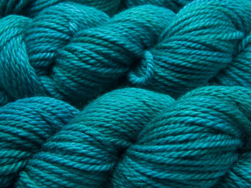 Mid tone teal BFL, baby alpaca and silk chunky yarn hand-dyed by Triskelion Yarn