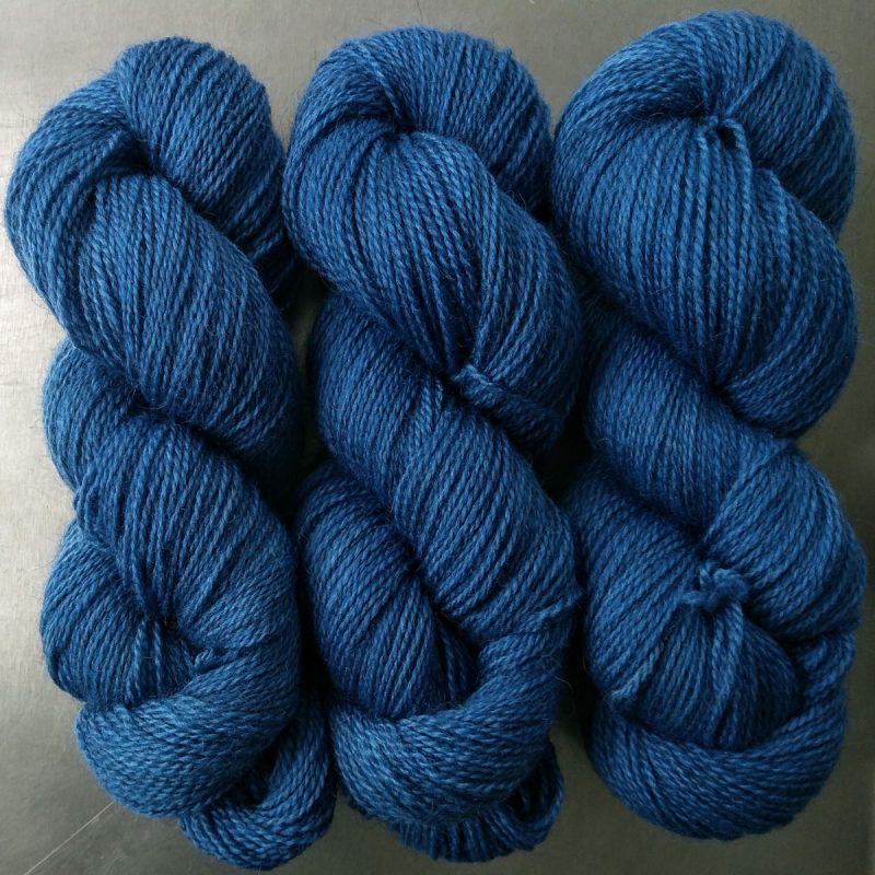 Gloaming - Semi-solid dark blue, with cobalt, and sea blue Bluefaced Leicester (BFL) / Gotland 4-ply (fingering) yarn. Hand-dyed by Triskelion Yarn