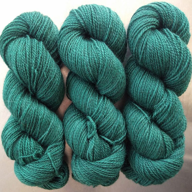Nicor - Semi-solid dark blue-green, with turquoise and grey tones Bluefaced Leicester (BFL) / Gotland 4-ply (fingering) yarn. Hand-dyed by Triskelion Yarn