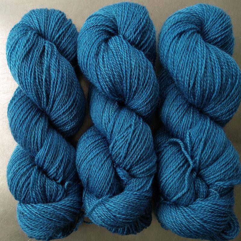 Wade - Semi-solid cerulean blue Bluefaced Leicester (BFL) / Gotland 4-ply (fingering) yarn. Hand-dyed by Triskelion Yarn