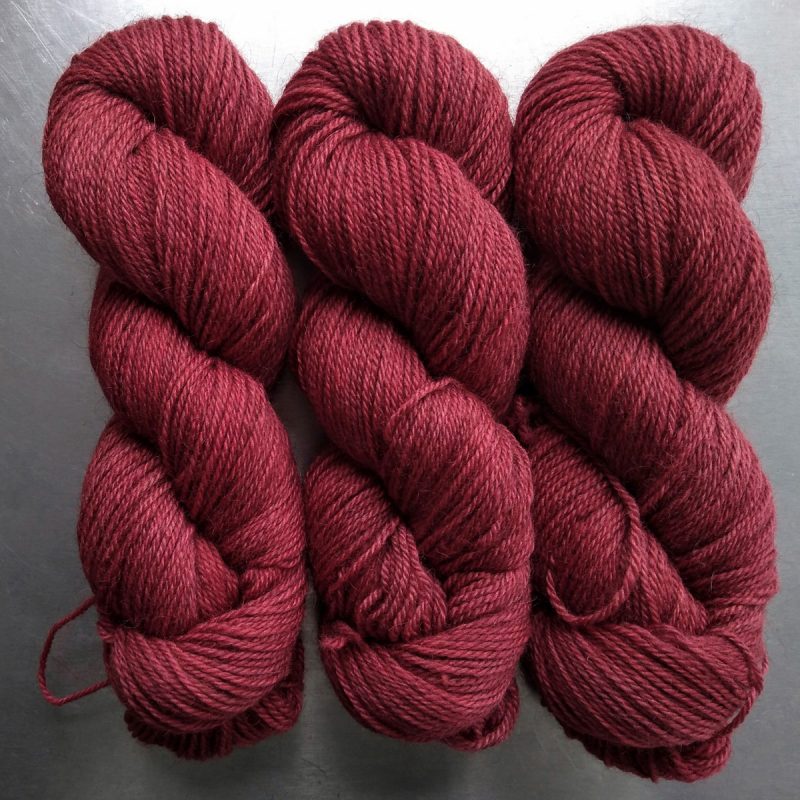 Ancient Heart - Semi-solid mid red, with brick and scarlet tones Bluefaced Leicester (BFL) / Gotland dlouble knit (DK) yarn. Hand-dyed by Triskelion Yarn