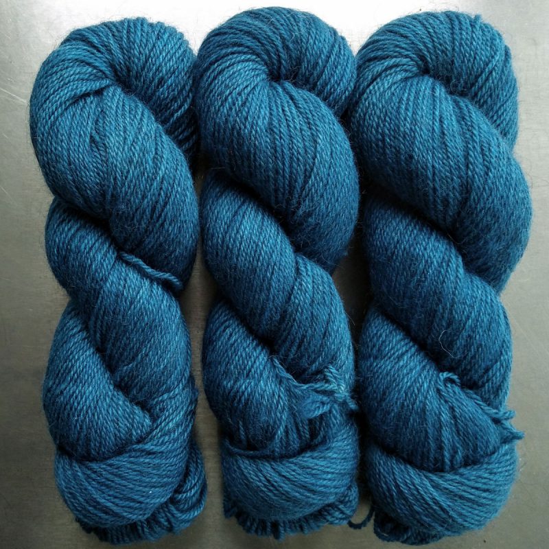 Wade - Semi-solid cerulean blue Bluefaced Leicester (BFL) / Gotland dlouble knit (DK) yarn. Hand-dyed by Triskelion Yarn