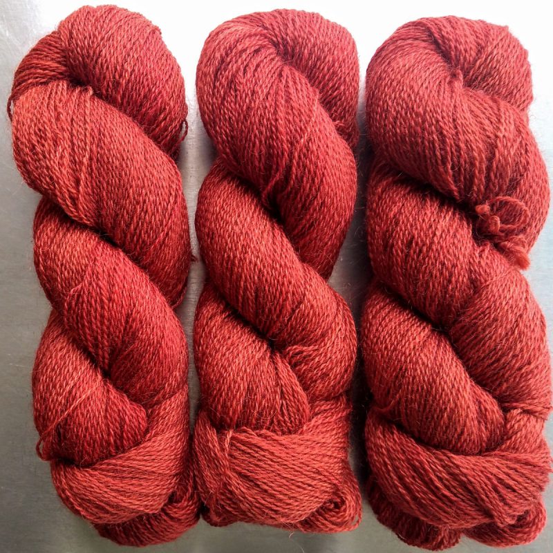 Aelwyd - Ember orange Falklands Corriedale and British Mohair 4-ply/fingering/sock yarn. Hand-dyed by Triskelion Yarn