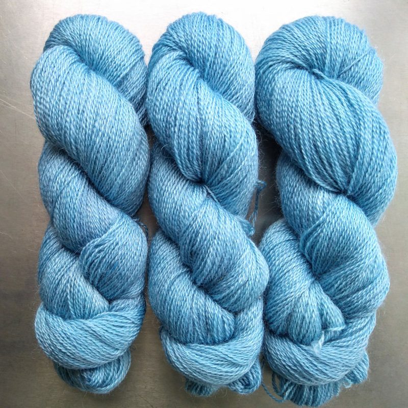 Gorwelion - Pale sky blue Falklands Corriedale and British Mohair 4-ply/fingering/sock yarn. Hand-dyed by Triskelion Yarn
