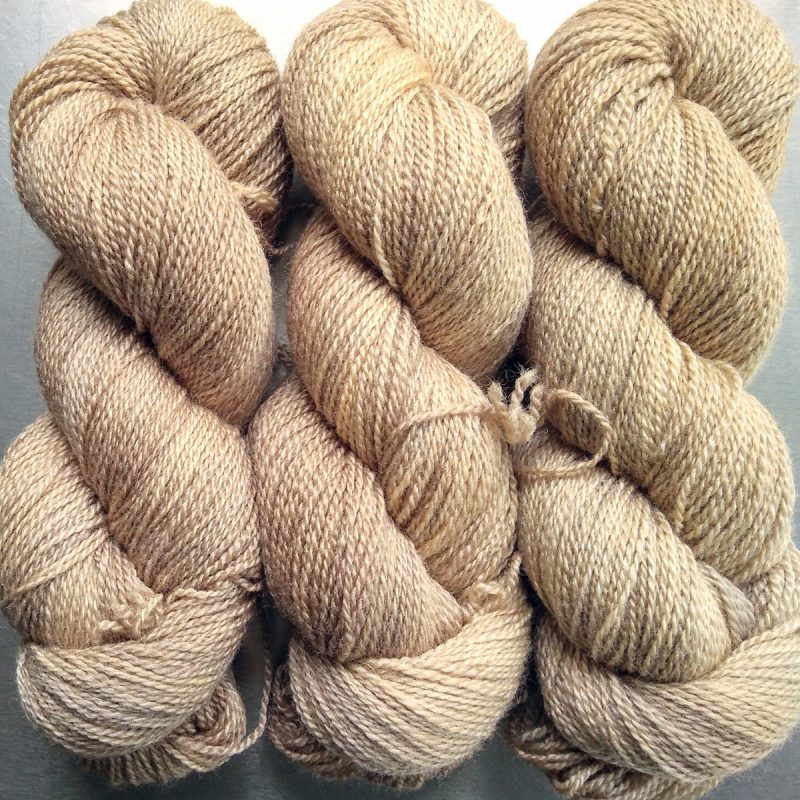 Almond - warm beige-brown Bluefaced Leicester / silk 4-ply yarn. Hand-dyed by Triskelion Yarn.
