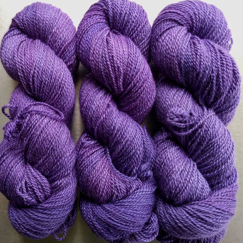 Lupin - Mid-tone violet Bluefaced Leicester / silk 4-ply yarn. Hand-dyed by Triskelion Yarn.