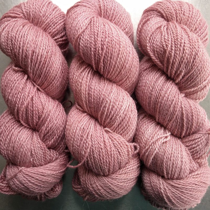 Mallow - soft pale pink Bluefaced Leicester / silk 4-ply yarn. Hand-dyed by Triskelion Yarn.