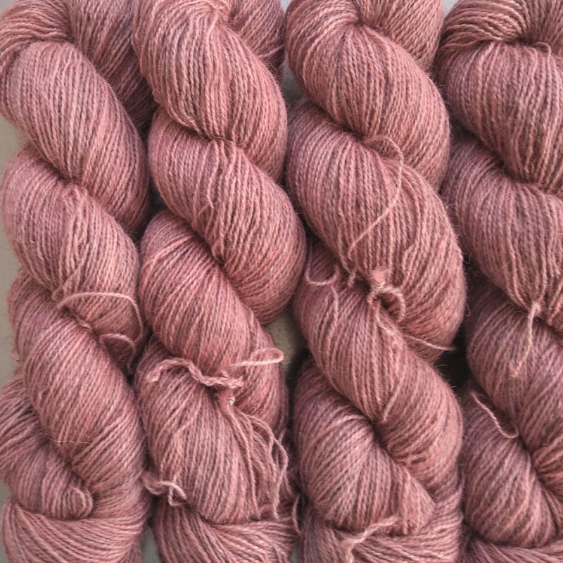 Eostre - Soft pink Bluefaced Leicester (BFL) / Gotland / Wensleydale 4-ply (fingering) weight high-twist sock yarn. Hand-dyed by Triskelion Yarn