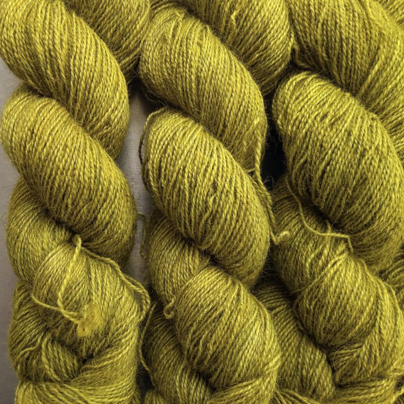 Frea - Light chartreuse green Bluefaced Leicester (BFL) / Gotland / Wensleydale 4-ply (fingering) weight high-twist sock yarn. Hand-dyed by Triskelion Yarn