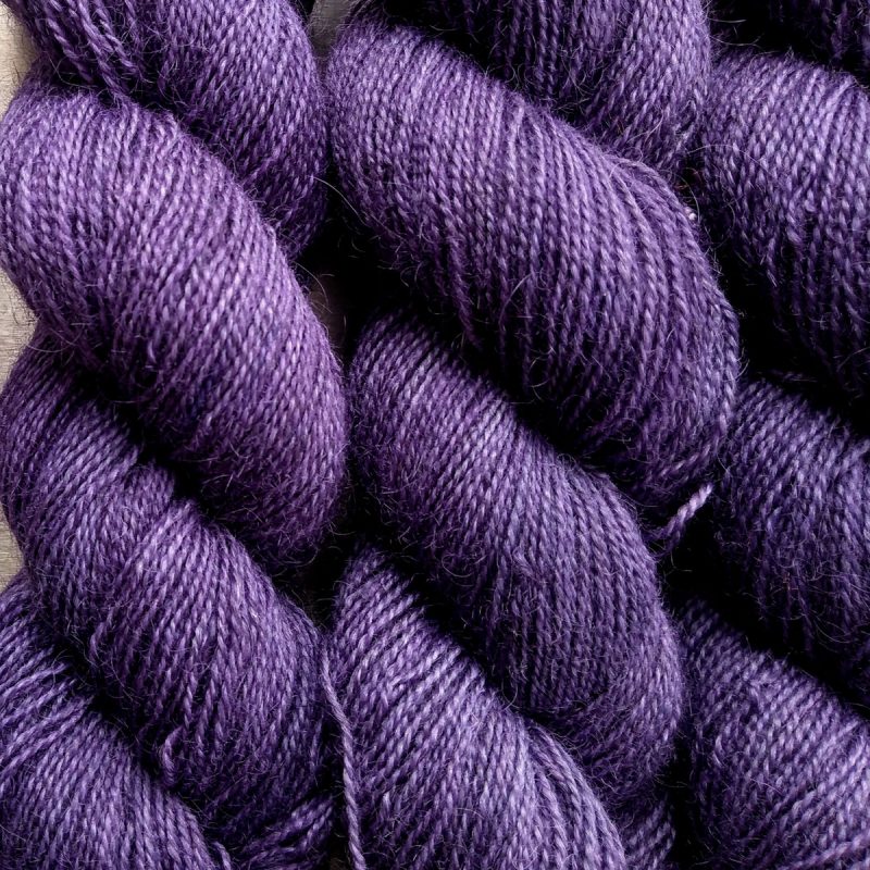 Peace Weaver - Soft mid-tone blue-violet Bluefaced Leicester (BFL) / Gotland / Wensleydale 4-ply (fingering) weight high-twist sock yarn. Hand-dyed by Triskelion Yarn