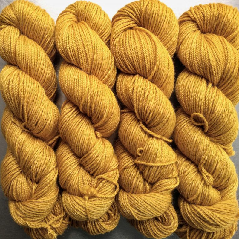 Heaven’s Gem - Rich imperial yellow Baby Alpaca Silk & Cashmere double-knit yarn. Hand-dyed by Triskelion Yarn.