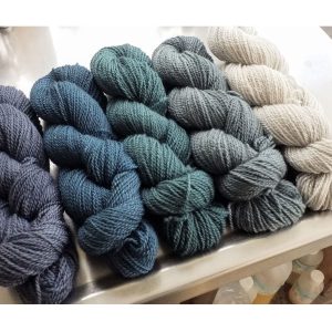 Ocean Greys Bluefaced Leicester / silk 4-ply yarn. Hand-dyed by Triskelion Yarn.